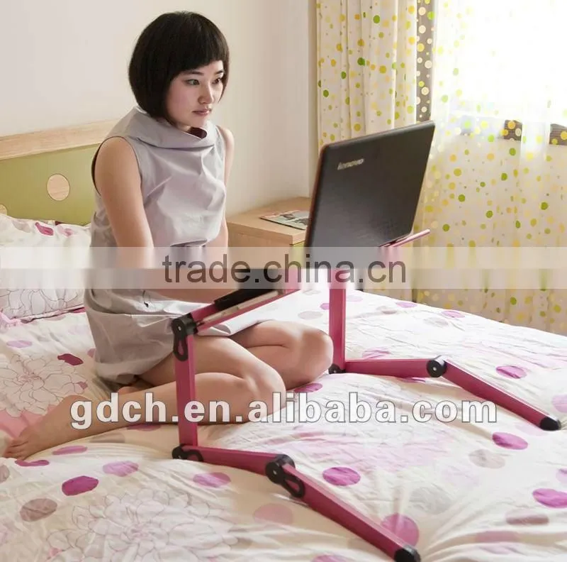 Portable folding laptop swivel table with adjustable height