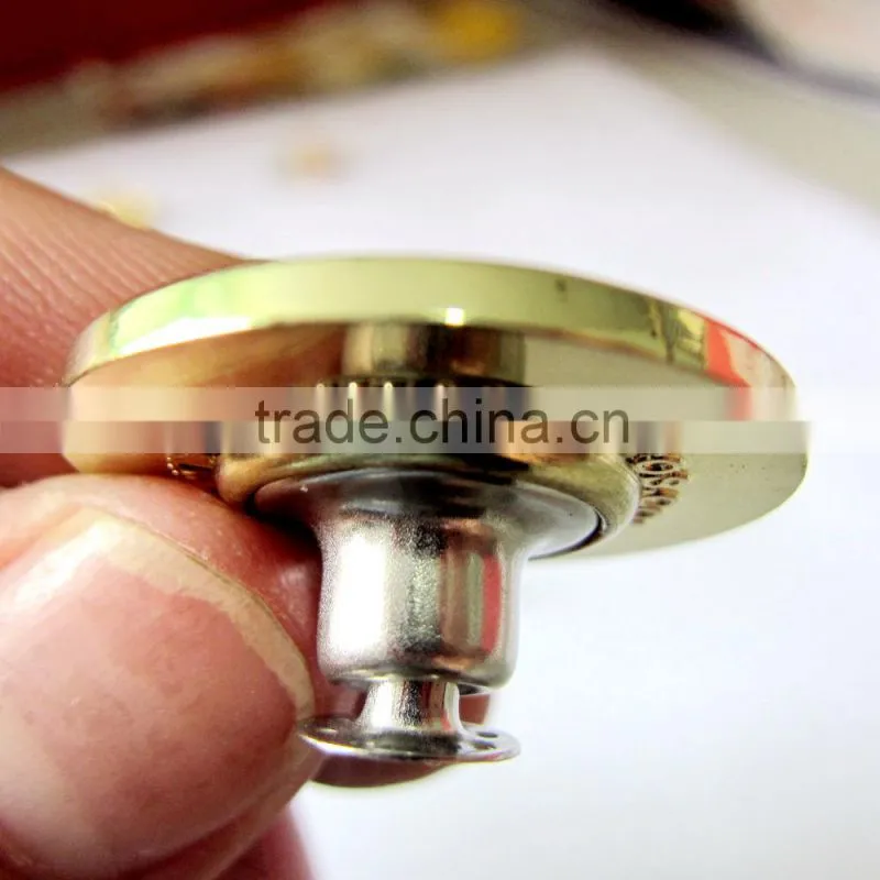 a crystal gold color jeans button