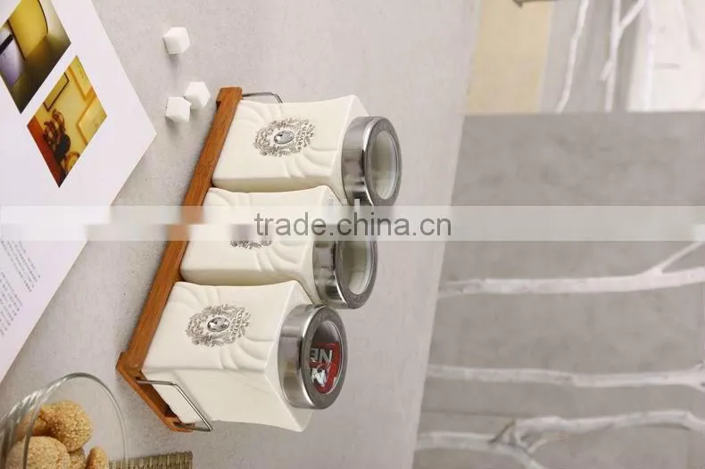 ceramic canister set with stainless lid & wooden stand