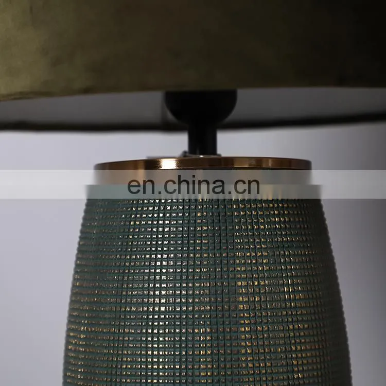 Unique relief surface design green cylinder shape hotel ceramic night lamp for living room