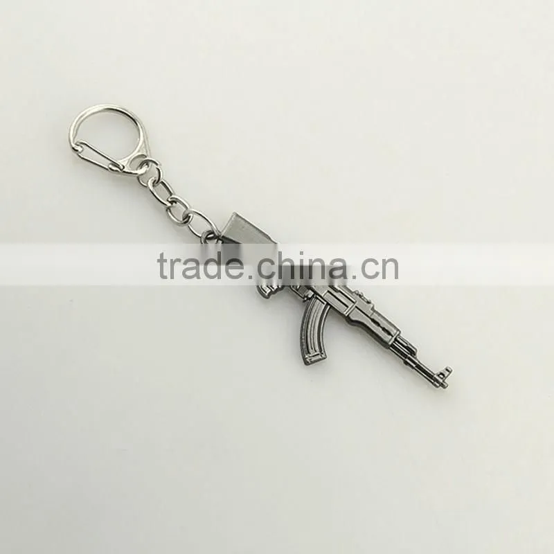 Small gift silver plated metal gun design stainless steel keychain for men