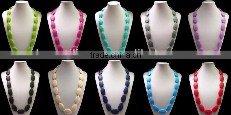 Turqoise silicone teething necklace for mom to wear and baby to enjoy
