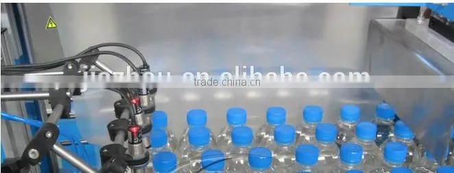 Professional full automatic film shrinking wrapping packing machine for PET bottle