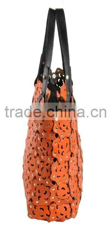 2012 fashion leather handbag ladies bag with punch flower patterns!