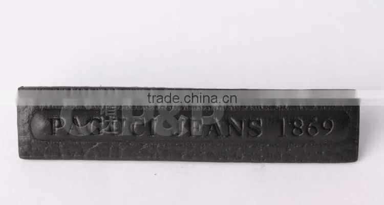 Black hot selling embossing logo on leather for jeans