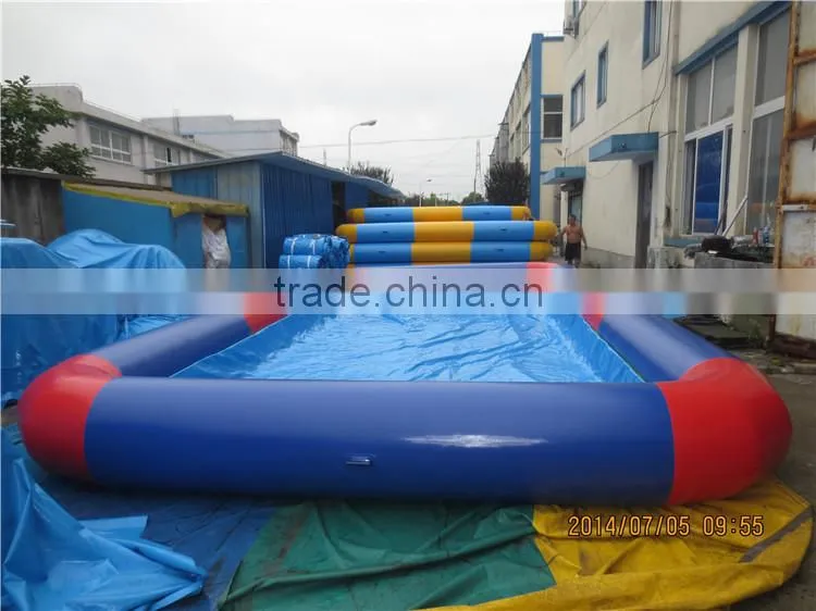 Low price floating inflatable boat swimming pool for sale