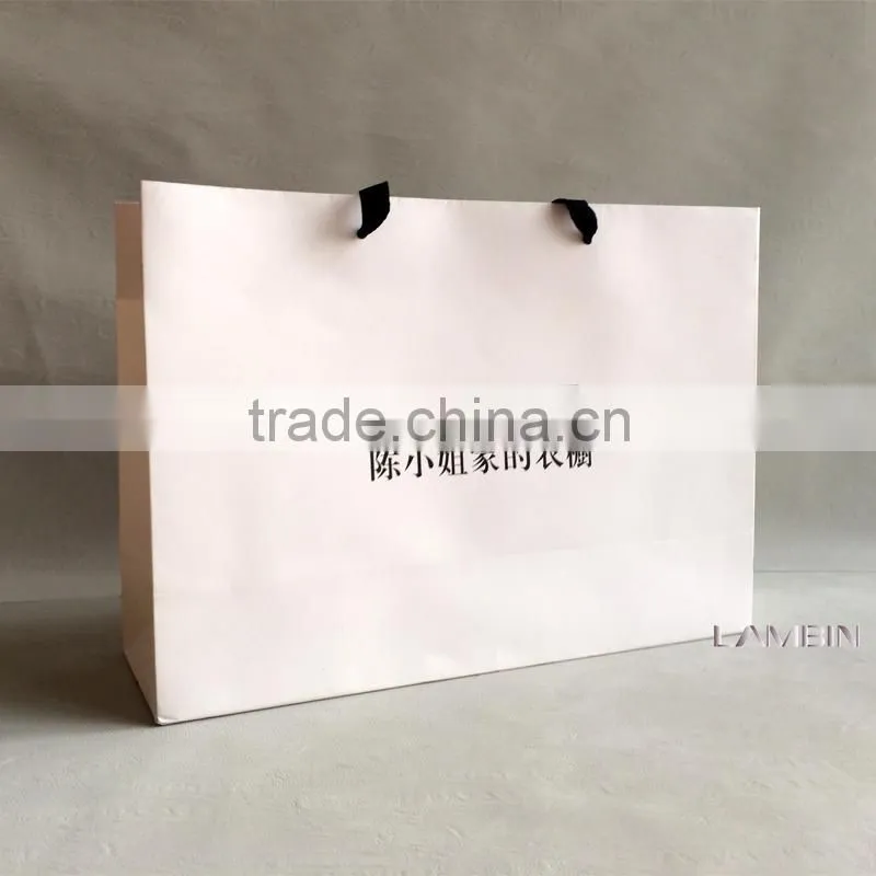 Recyclable white paper shopping bag with handles