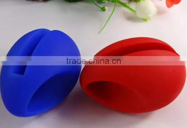 Egg shape silicone loudspeaker / silicone phone holder