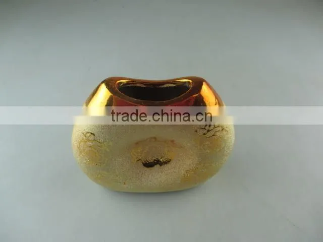 beautiul golden porcelain type vase with flower design