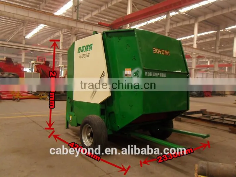 Grass baling machine