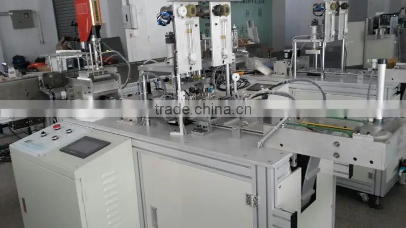 Outside ear loop welding machine with ribbon