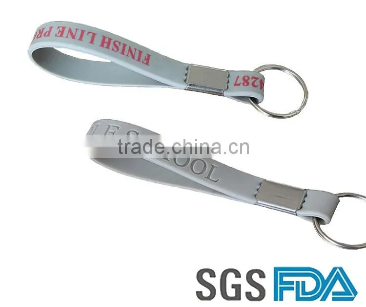 China Manufacturer Cheap custom LOGO silicone wristband keychain