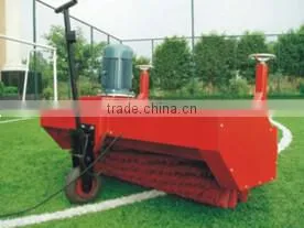 Triangular brush for artificial grass installation