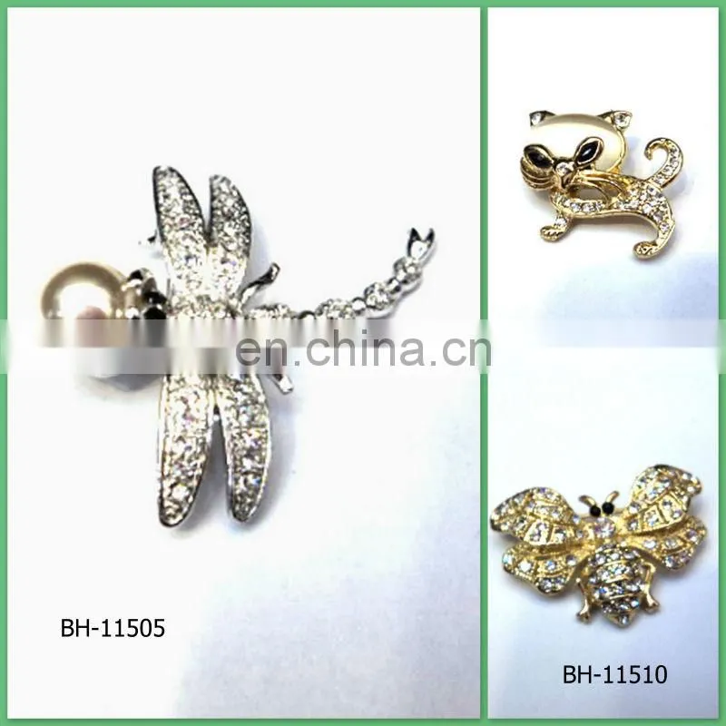 Gold crystal spider brooch