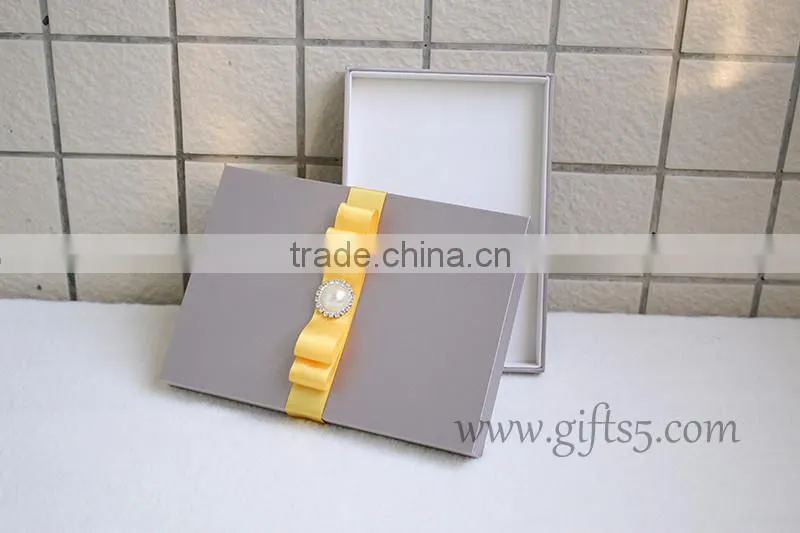 Fancy wedding invitation gift box with ribbon