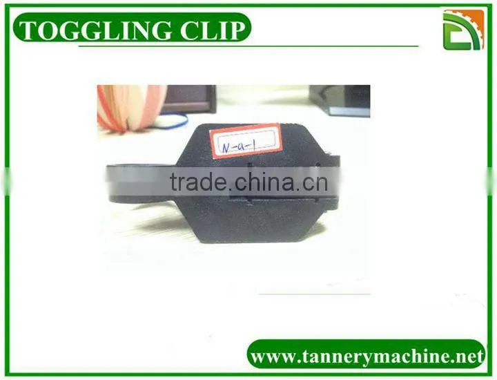 leather toggling machine clip