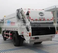 Sweep blade compression garbage truck