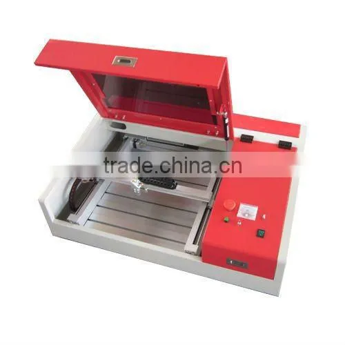 Mini machine de gravure laser CO2 appliquer a plexiglace QX--4040