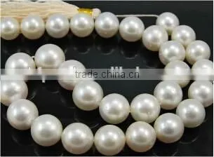Grade AA 11-12mm white round south sea pearl strands