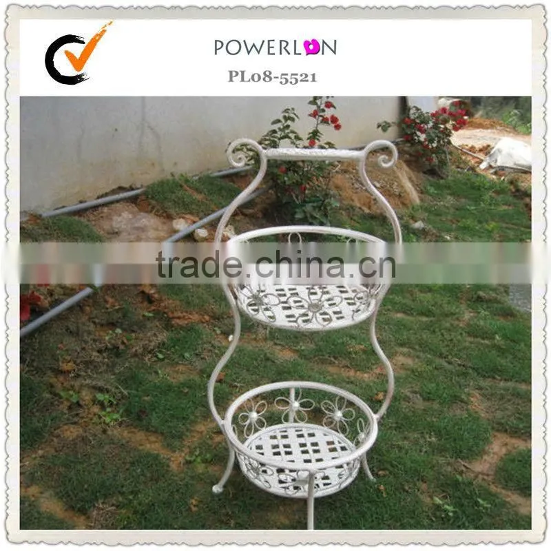 Antique metal plant pot trellis