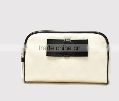 Dazzling PVC zipper closure cosmetic bag with black trim and decorations