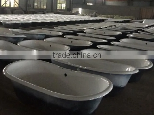 rectangular freestanding cast iron bathtub with wooden cradle