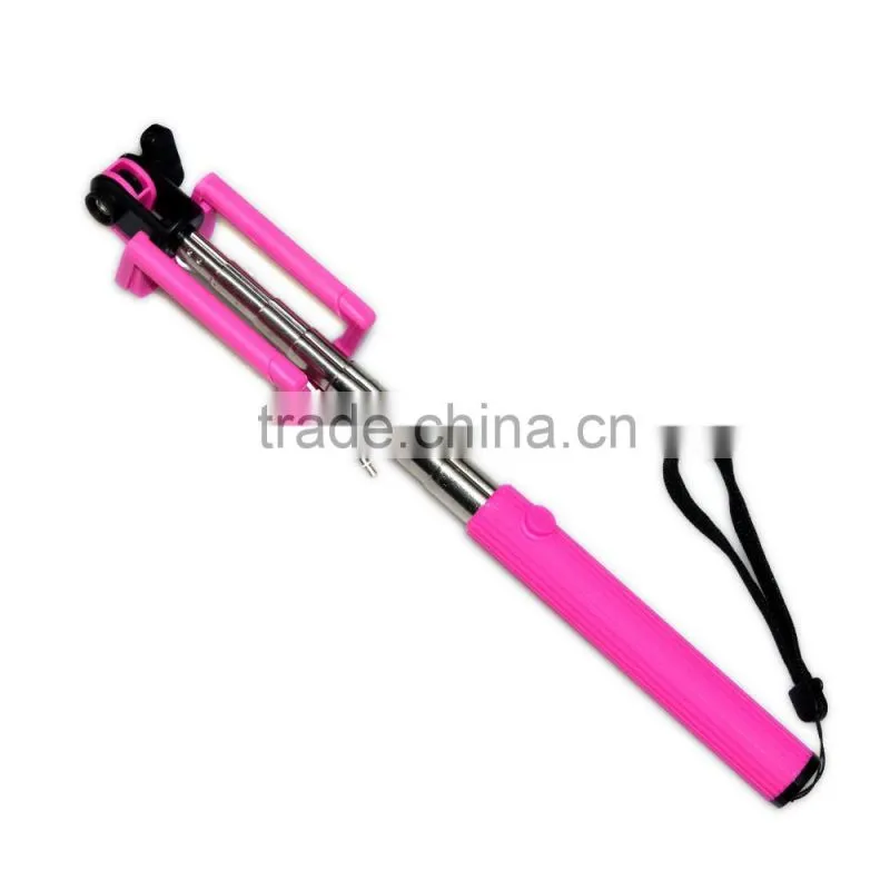 Monopod with mobile phone holder and built-in shutter release