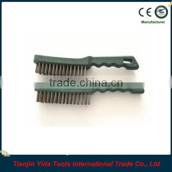black wire brush with plastic handle