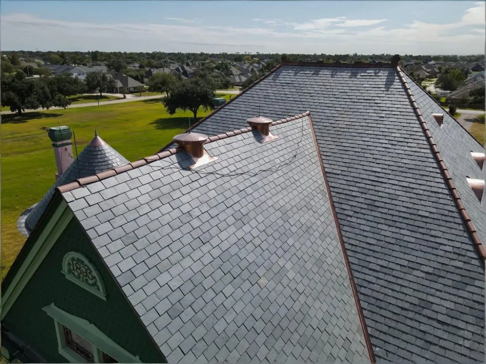 Why are natural slate tiles widely used in high-end villas, guesthouses, and innovative architectura
