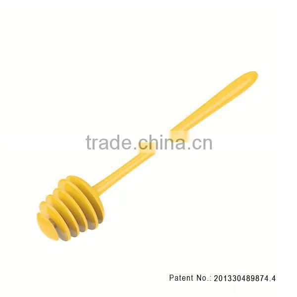 Silicone squirrel-and-pinecone honey dipper