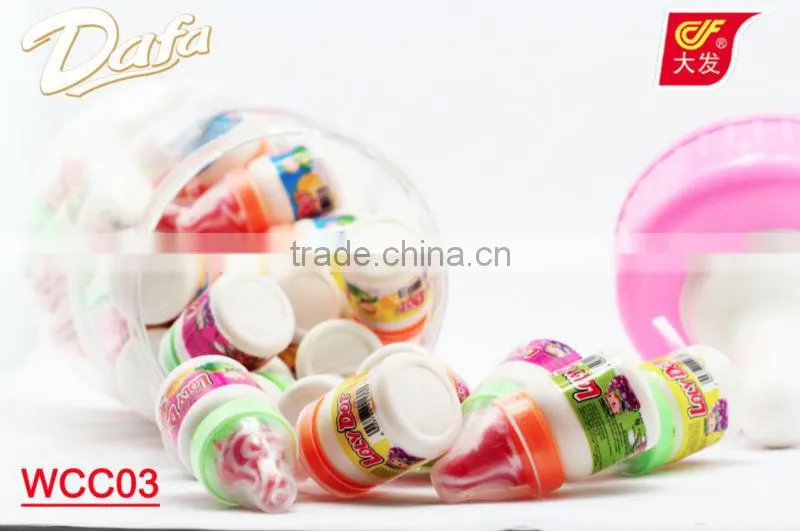 powder candy with lollipop in nipple bottle