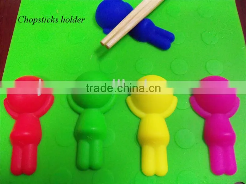 Silicone chopstick rest in kid shape