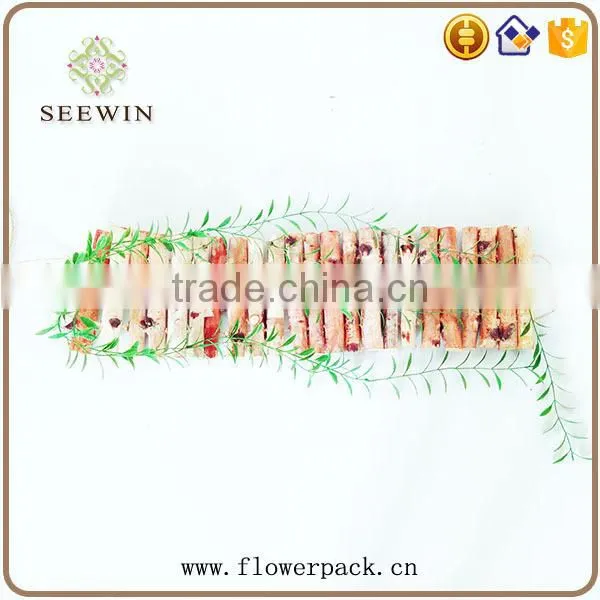 The birch stick is decorated in the garden