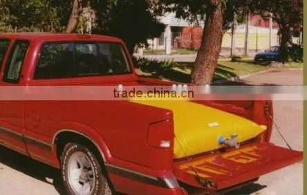 collapsible camping water bladder in pickup truck