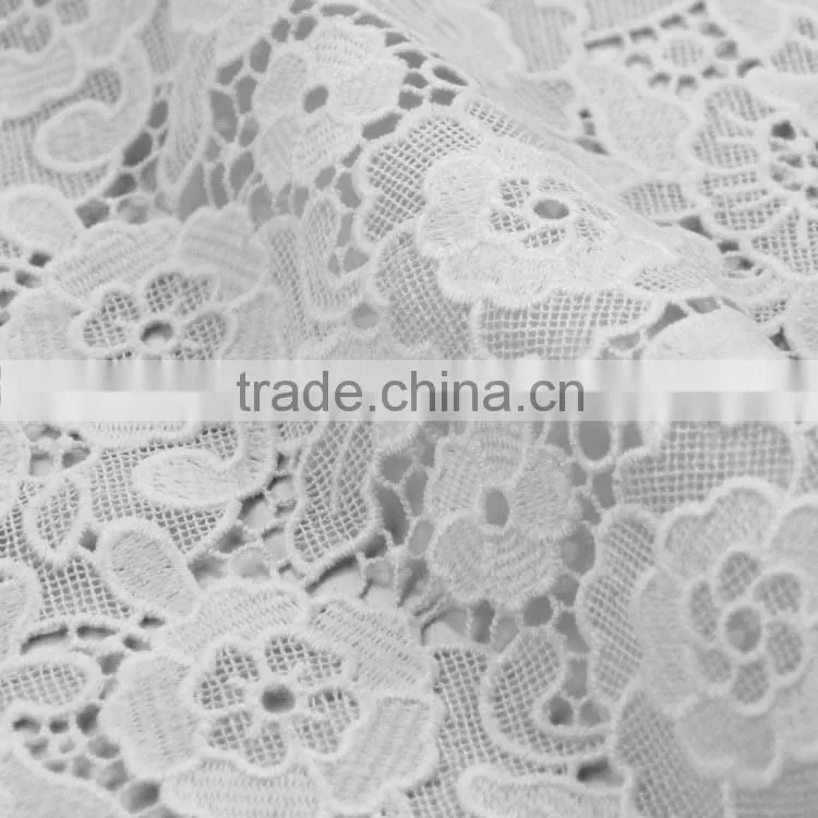 Fashion promotional custom new wedding net dress materials embroidery designs fabric by the yard