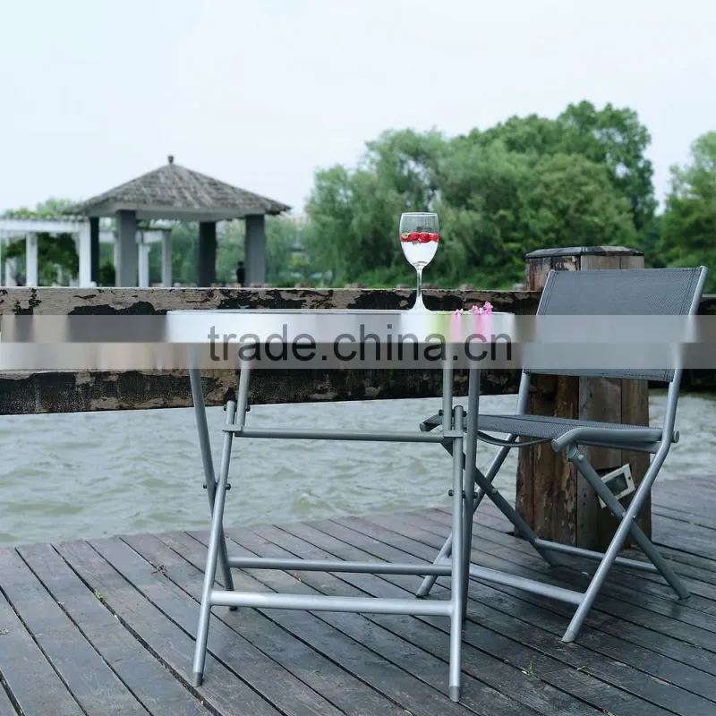 Metal folding table with silk screen printed stalinite top