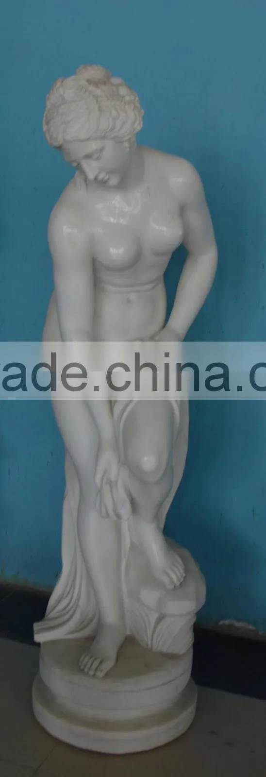 White marble bathing woman statue