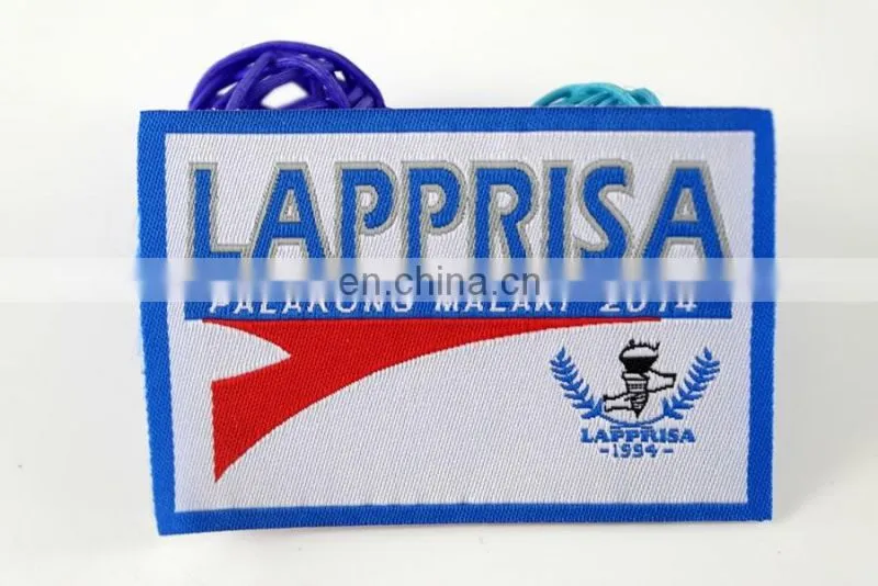 die cut shape with logo book and bird woven military emblems