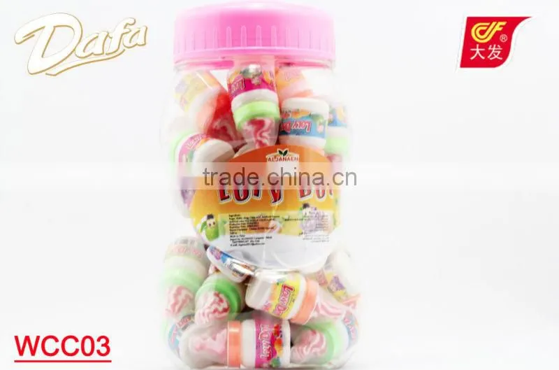 powder candy with lollipop in nipple bottle