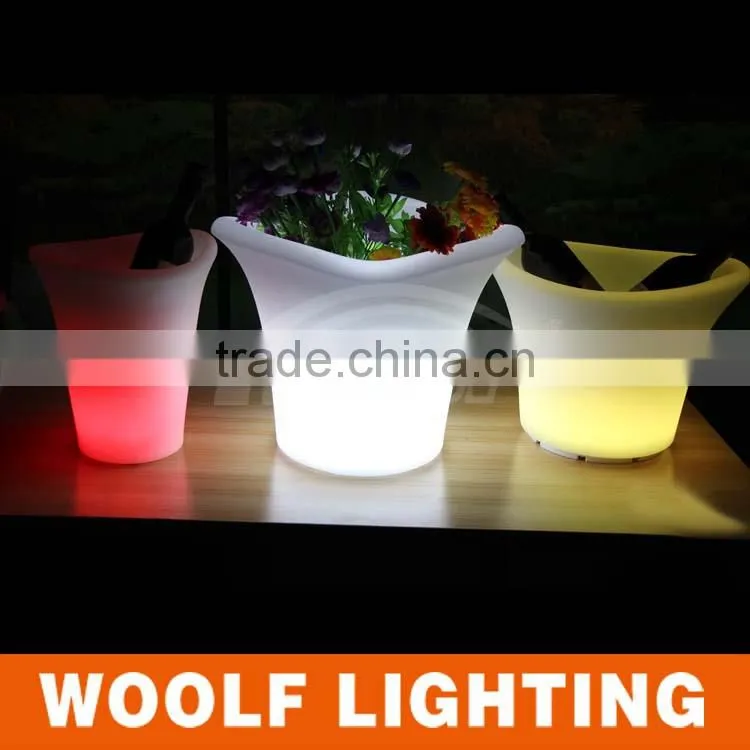 small white plastic lighted outdoor flower pots