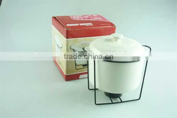 White ceramic soup tureen soup bowl with iron stand in stock