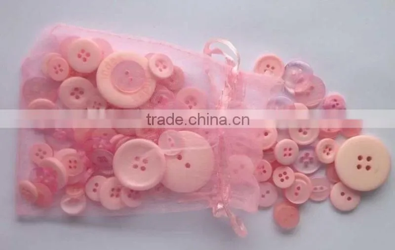 Assorted sizes pink buttons for kids handicraft making and decoration