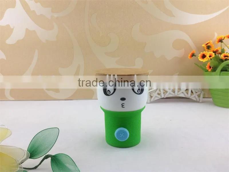 Porcelain coffee cup with wood lid