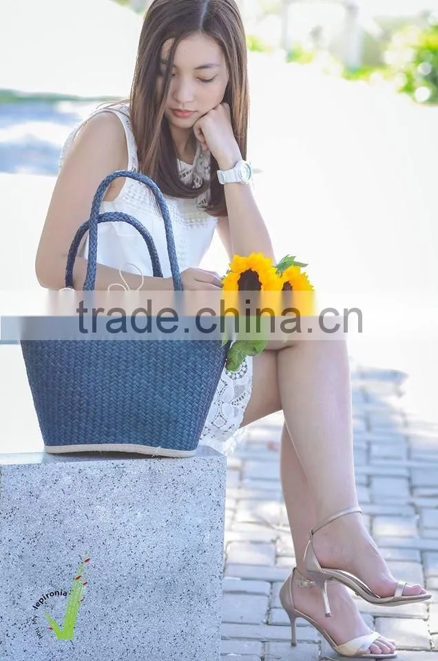 Seagrass beach bag with seashell decoration, cool design for summer holiday