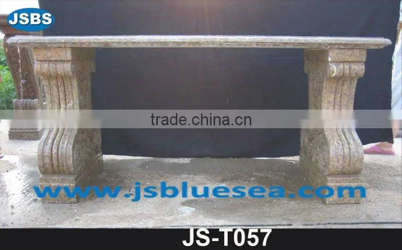 Stone carving of table and bench