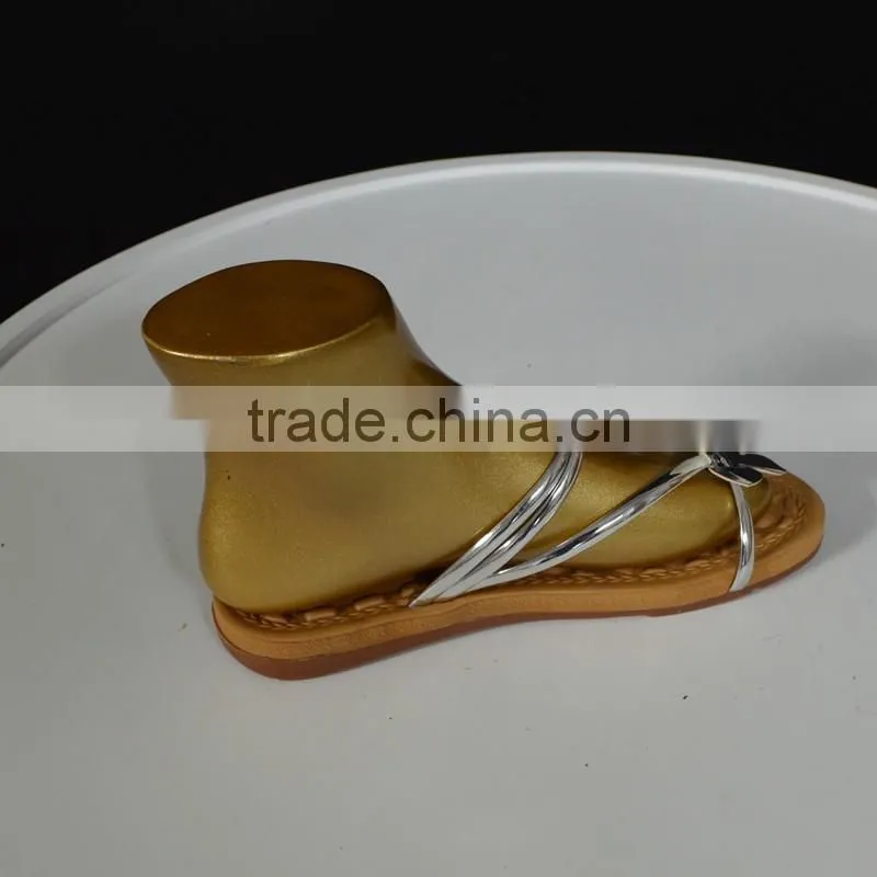Fashion flip-flops display Golden mannequin feet and foot for shoes display