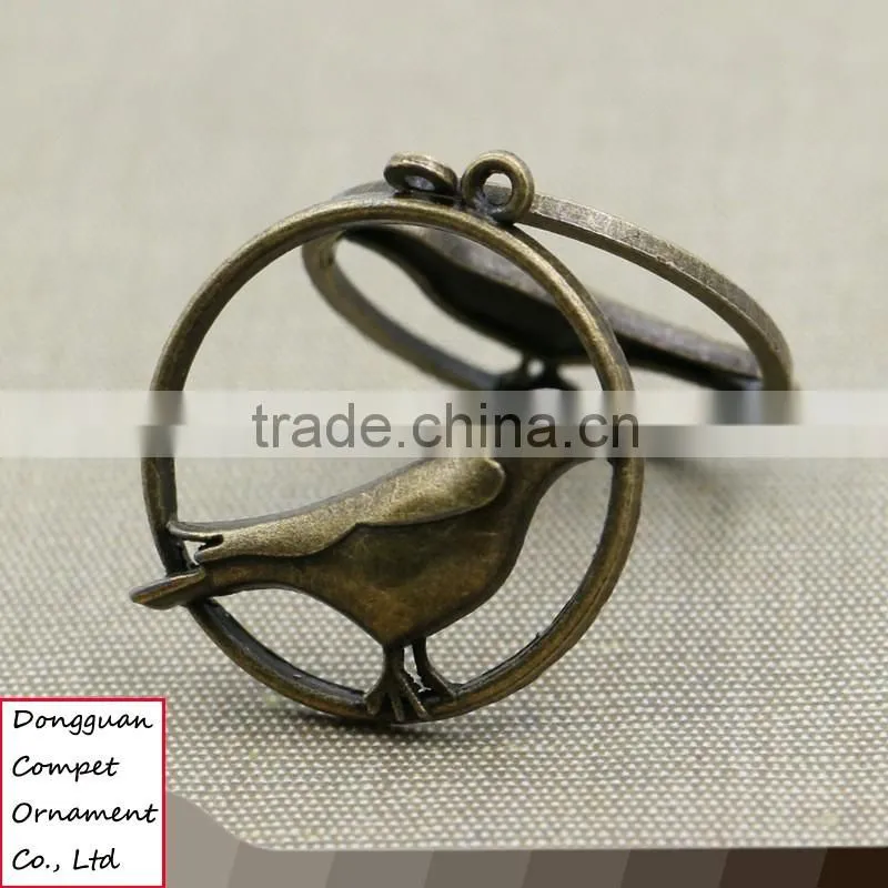 Wholesale metal plating zinc alloy hollow out cuckoo bird pendant