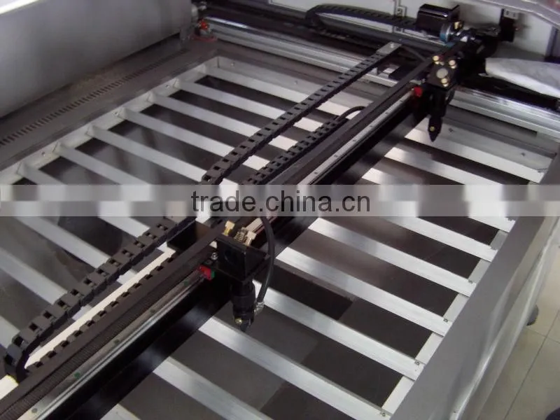 China Shandong Jinan beveling cutting engraving red light auto focus rotary axis cnc laser engraver
