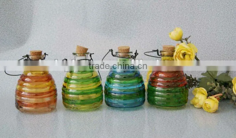 colored glass wasp bottle