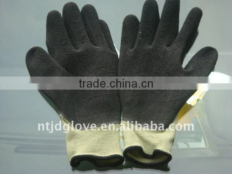Cut resistance gloves . Kevlar crinkle black latex coated gloves.